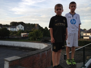 The boys enjoying the bridge in Brecon